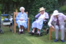 <Residents of Larchmere House enjoy a game of bowls in the garden>